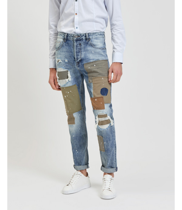 MIKE95 carrot fit jeans with patches rips and paint droplets