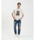 Jeans BRUCE regular fit con strappi e patch