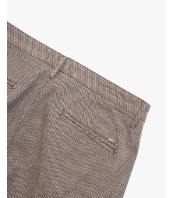 Cotton trousers with dotted effect