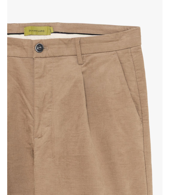 Cotton trousers with dotted effect