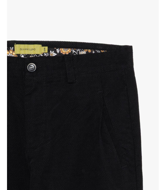 Cotton trousers with dotted effect