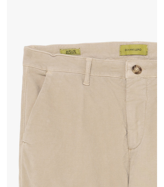 Cotton trousers with dotted effect