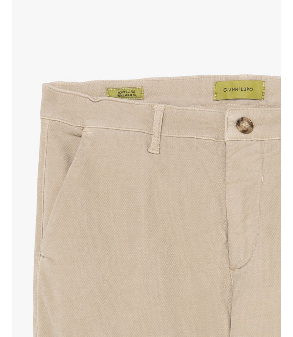 Cotton trousers with dotted effect