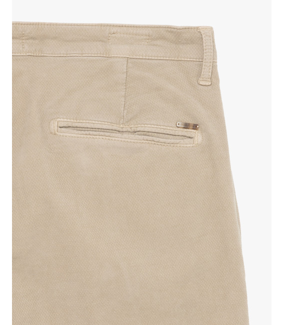 Cotton trousers with dotted effect
