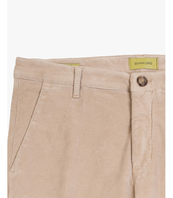 Cotton trousers with dotted effect