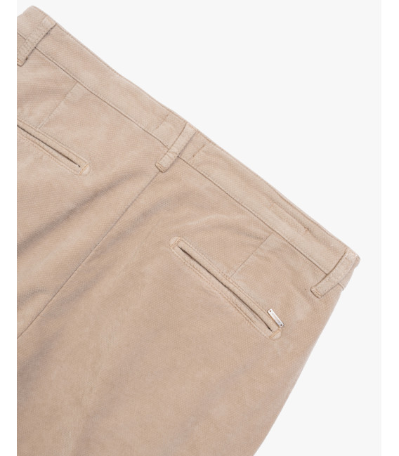 Cotton trousers with dotted effect