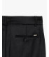 Pleated trousers with turn-up hem