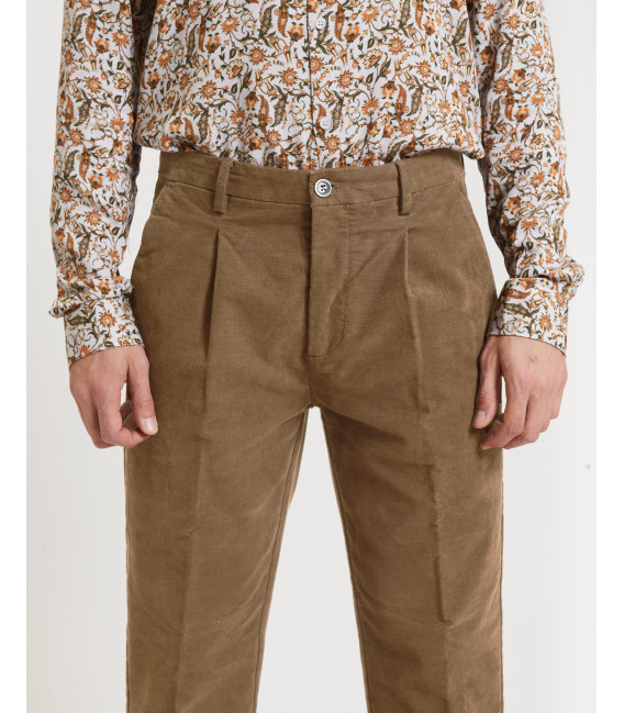 Cotton trousers with dotted effect