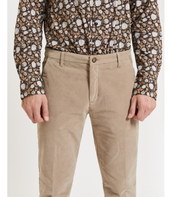Cotton trousers with dotted effect