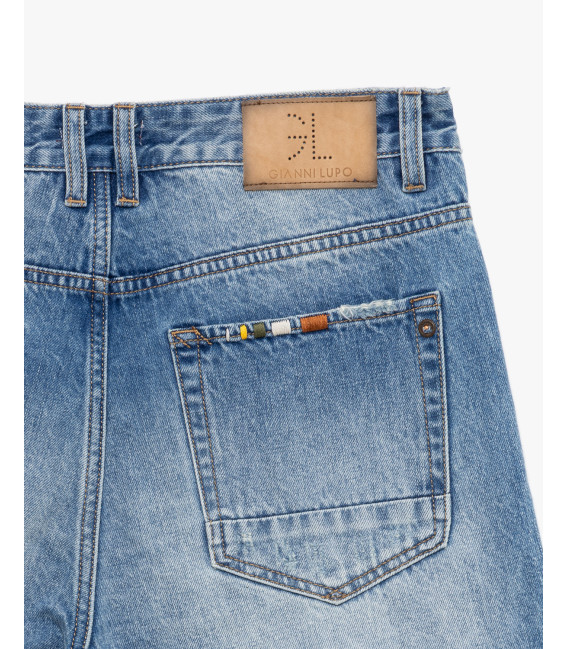 Denim bermuda shorts with distressed details
