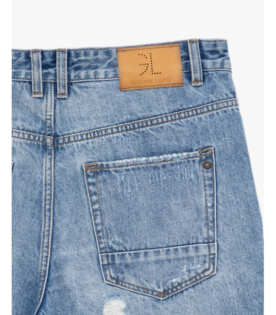 Denim bermuda shorts with distressed details