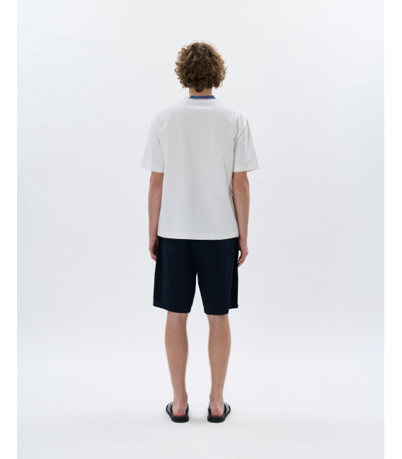 Bermuda shorts with side buckles