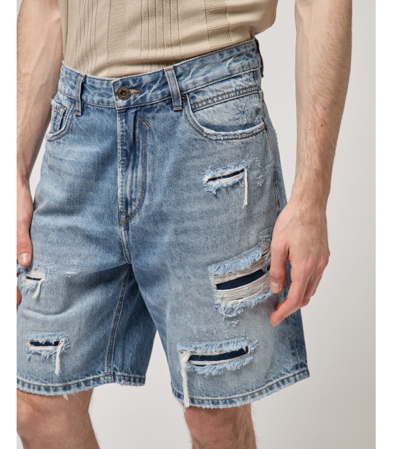 Denim bermuda shorts with distressed details