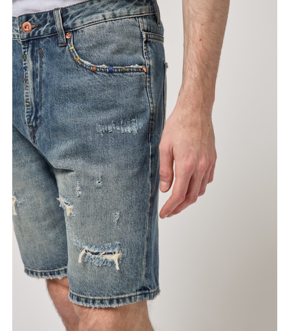 Denim bermuda shorts with used wash and destroyed details