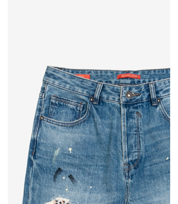 GRANT100 carrot fit jeans with rips & repairs patched and paint droplets