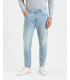 MIKE95 carrot fit medium wash jeans with scratches