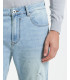 MIKE95 carrot fit medium wash jeans with scratches
