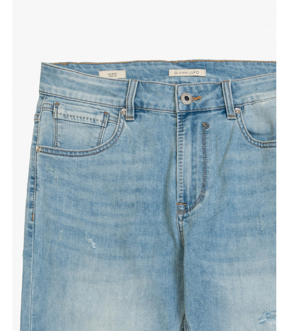 MIKE95 carrot fit medium wash jeans with scratches