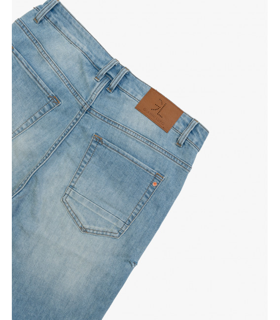 MIKE95 carrot fit medium wash jeans with scratches