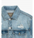 Denim jacket with rips