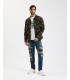 Overshirt camouflage con patchwork