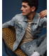 Denim jacket with rips