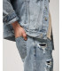 Denim jacket with rips