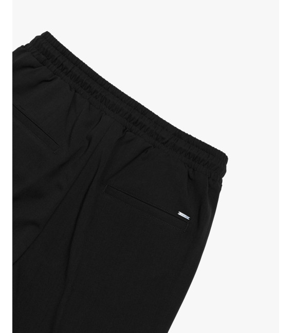 Technical fabric trousers with drawstrings