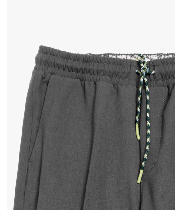 Technical fabric trousers with drawstrings