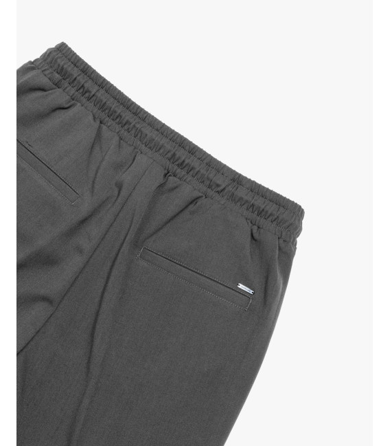 Technical fabric trousers with drawstrings