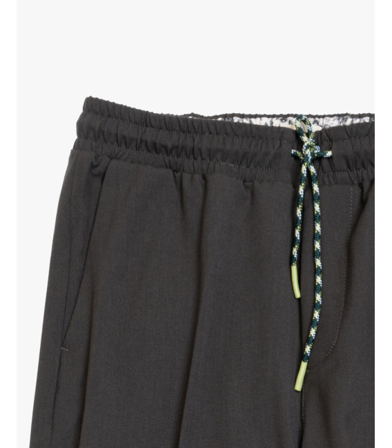 Technical fabric trousers with drawstrings