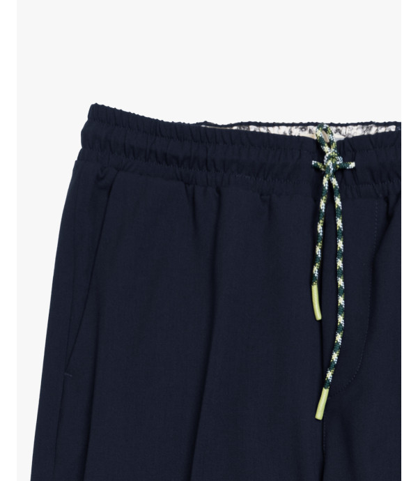 Technical fabric trousers with drawstrings