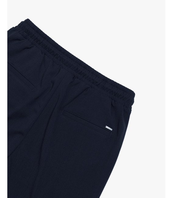 Technical fabric trousers with drawstrings