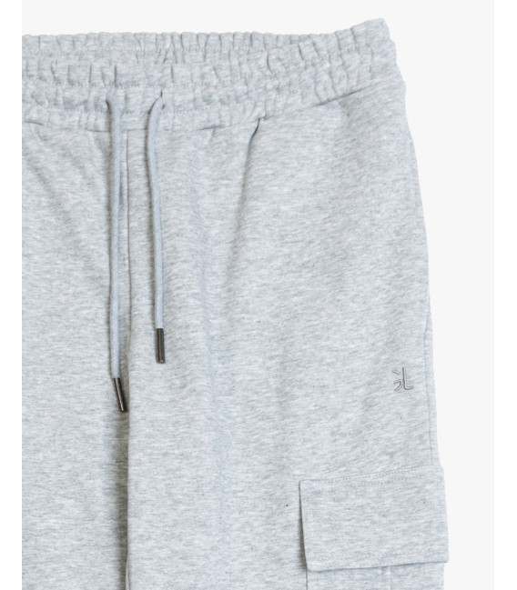 Jogger in felpa tasconato