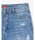Bermuda in denim con abrasioni