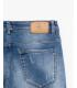 KEVIN skinny-fit jeans in medium wash and distressed details