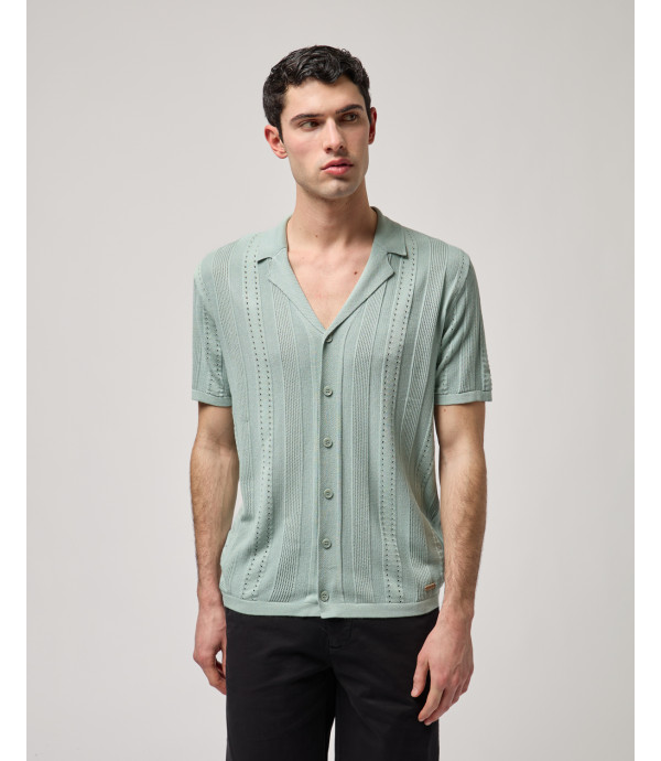 Knitted shirt with transparencies