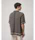 Knit shirt with contrasting pattern