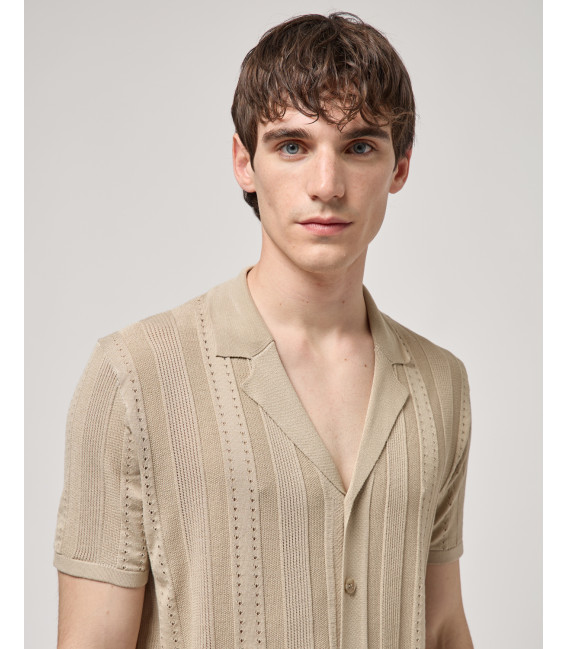 Knitted shirt with transparencies