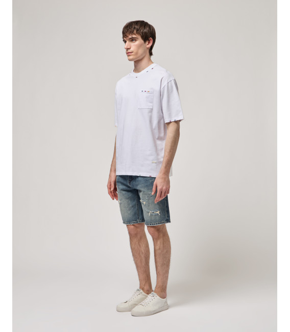 Bermuda in denim con lavaggio used e dettagli destroyed